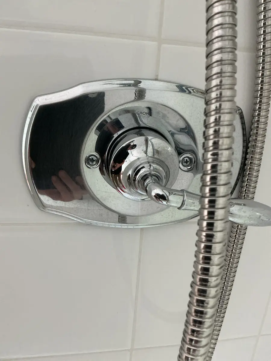 Chrome shower valve trim where the cartridge behind it was causing low pressure