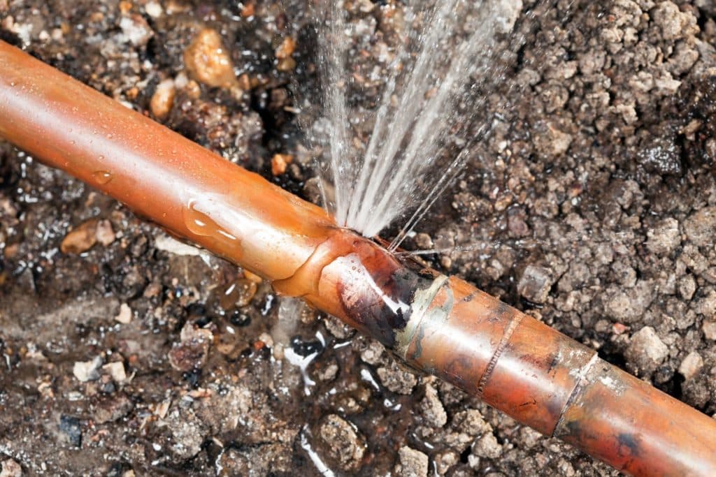 NSP Plumbing repairing a residential main water line in Grand Rapids, MI